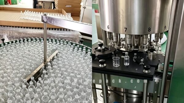 Small glass bottles passing through an automated bottling line